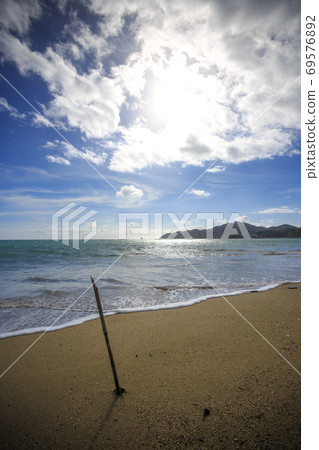 Beach and sunset coastline 69576892