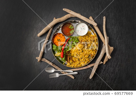 Mixed rice on the spices (Biryani) 69577669