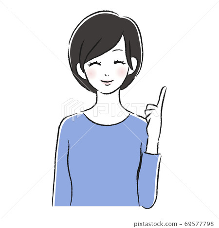 一個微笑的婦女指向 一個微笑的婦女指向 69577798