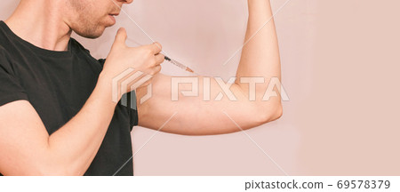 Man inject steroid hormone. Growth injection procedure 69578379