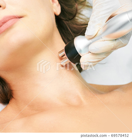 Dermatology skin care facial therapy. Medical spa anti wrinkles procedure. Woman 69578452