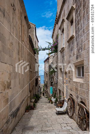 Narrow street in Korcula old town, Croatia on the coast of the island of Korcula 69581784