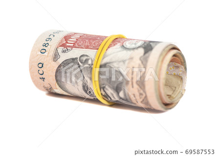 Roll of Indian rupees isolated on white 69587553