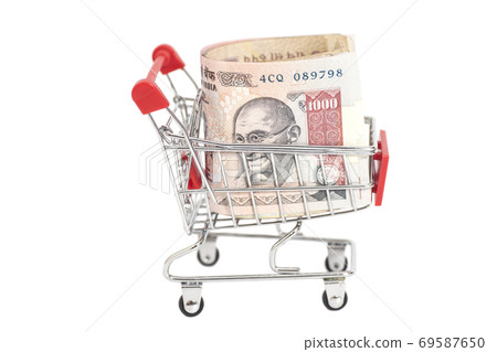 Indian 1000 rupees in shopping cart isolated on white background 69587650