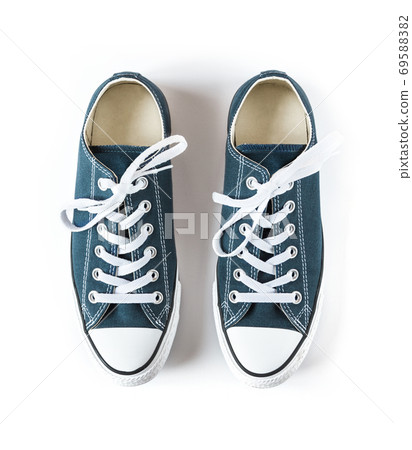 Blue sneakers isolated on white background 69588382