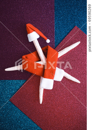 Summer travel concept. Star fish in Christmas decoration 69590269