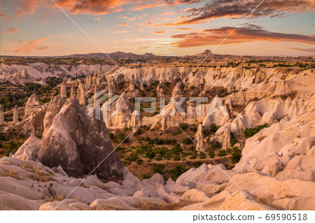 Rocky landscape in Cappadocia at sunset, Turkey. Rocky landscape in Cappadocia at sunset, Turkey. 69590518