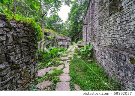 Ruins of abandoned jungle village in China 69592037