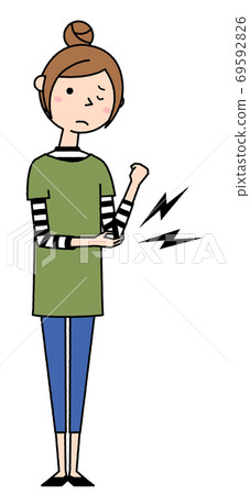Young woman with a sore elbow Young woman with a sore elbow 69592826