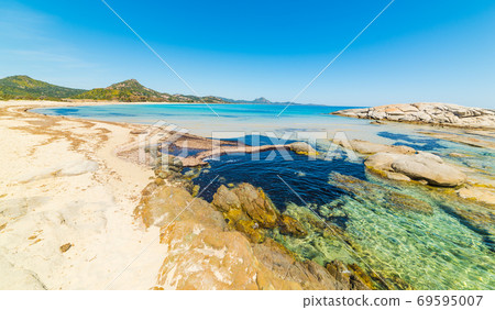 Scoglio di Peppino shore in the springtime Scoglio di Peppino shore in the springtime 69595007