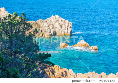 Rocks and blue water Rocks and blue water 69595428