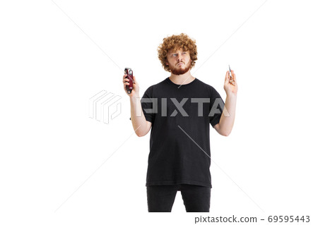 Stylish hairdresser, barber isolated on white studio background Stylish hairdresser, barber isolated on white studio background 69595443