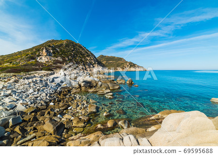 Rocks in Punta Molentis shore line 69595688
