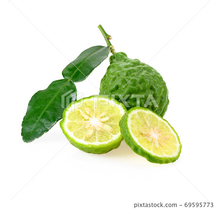 Kaffir lime with leaves on white background Kaffir lime with leaves on white background 69595773