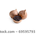 black garlic on white background 69595793