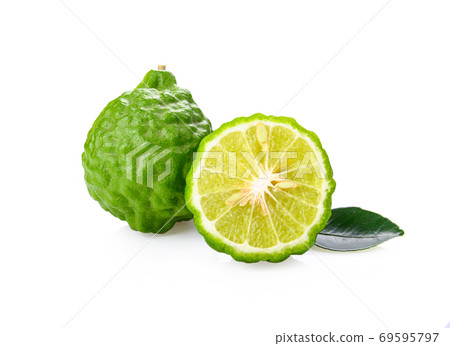 Kaffir lime with leaves on white background Kaffir lime with leaves on white background 69595797