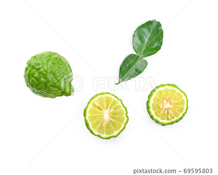 Kaffir lime with leaves on white background Kaffir lime with leaves on white background 69595803