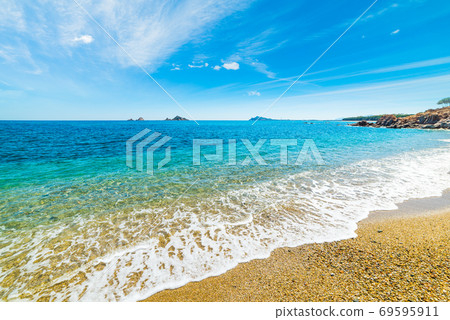 Clouds over Santa Maria Navarrese beach Clouds over Santa Maria Navarrese beach 69595911