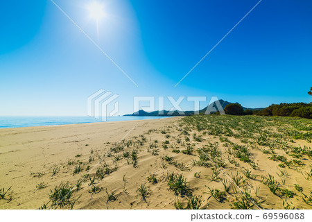 Sun shining over Feraxi shore 69596088