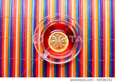 Top view of lemon tea on table cloth 69596192