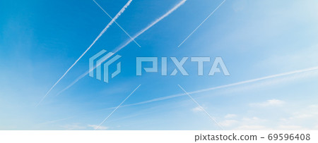 Blue sky with contrails Blue sky with contrails 69596408