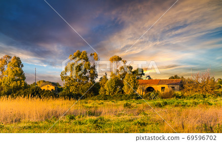 scenic sunset in Sardinian countryside scenic sunset in Sardinian countryside 69596702