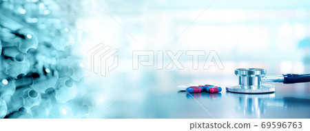 stethoscope with capsule drug and molecular chemistry structure in health science lab background stethoscope with capsule drug and molecular chemistry structure in health science lab background 69596763
