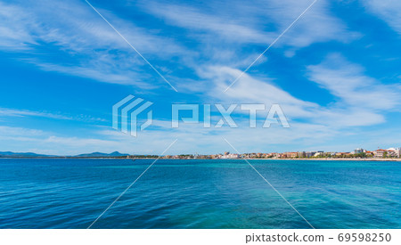 small clouds over Alghero blue sea small clouds over Alghero blue sea 69598250
