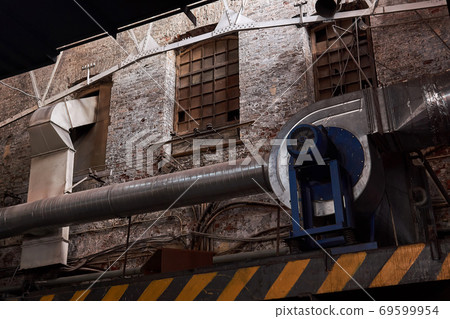 fragment of the interior of an old factory hall 69599954