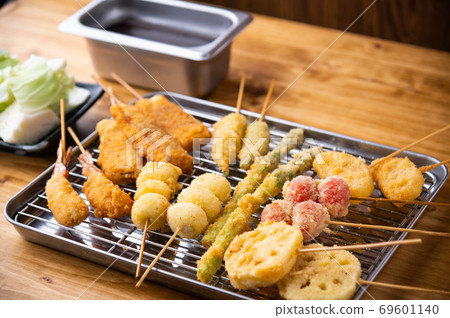 Kushikatsu or Kushiage, japanese Osaka style deep fried skewers Kushikatsu or Kushiage, japanese Osaka style deep fried skewers 69601140