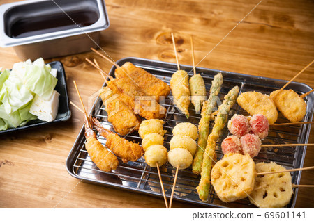 Kushikatsu or Kushiage, japanese Osaka style deep fried skewers 69601141