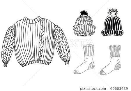 A set of warm winter clothes. Sweater, socks, hats A set of warm winter clothes. Sweater, socks, hats 69603489