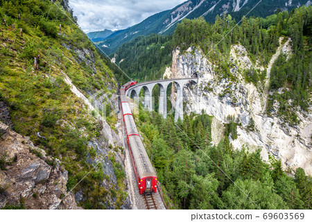 Train runs on Landwasser Viaduct, Filisur, Switzerland 69603569