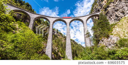Landscape with Landwasser Viaduct in summer, Filisur, Switzerland. Panoramic view of railroad bridge 69603575