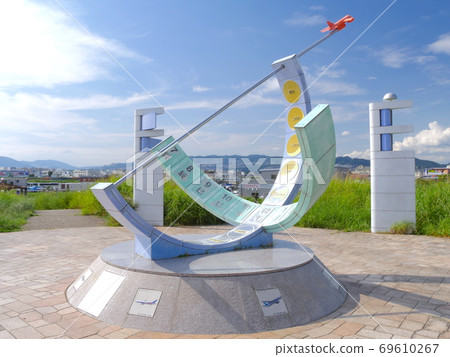 A monument in the air front oasis of the park "Shimogawara Ryokuchi" overlooking Osaka International Airport A monument in the air front oasis of the park "Shimogawara Ryokuchi" overlooking Osaka International Airport 69610267