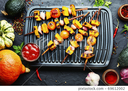 Grilled pumpkin on a skewer Grilled pumpkin on a skewer 69612002