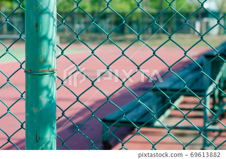 Wire Net Beside a Sports Field. Wire Net Beside a Sports Field. 69613882