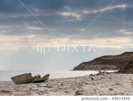 seascape with broken boat 69614948
