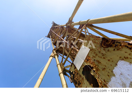 old high metal tower building with stairs bottom view old high metal tower building with stairs bottom view 69615112