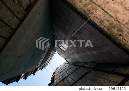 old gray high building in Uraine Donbass 69615123