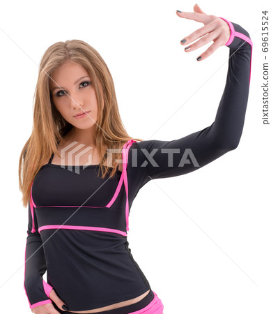 Pretty blonde dancer in top and shorts studio shot 69615524
