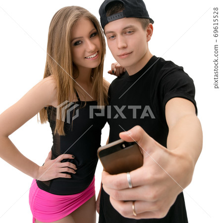 Young modern dance couple making selfie in studio 69615528