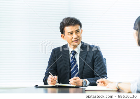 Business scene middle-aged Business scene middle-aged 69616130