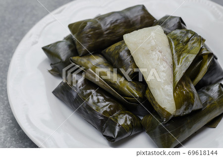 Sweet Sticky Rice (or "Khao Tom Mad" in Thai name) is a Traditional Thai Dessert. Sweet Sticky Rice (or "Khao Tom Mad" in Thai name) is a Traditional Thai Dessert. 69618144