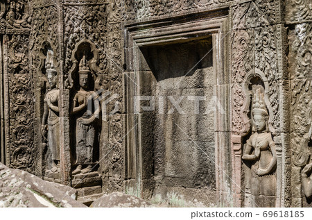 Ta Prohm Temple is The One Attractive Temple In Angkor Thom Area at Siem Reap Province of Cambodia. Ta Prohm Temple is The One Attractive Temple In Angkor Thom Area at Siem Reap Province of Cambodia. 69618185