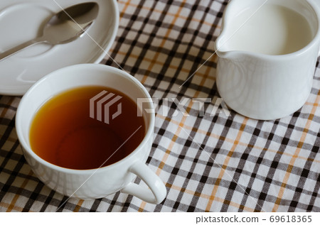 Cup of Tea and Milk for the Time of Tea Break. Cup of Tea and Milk for the Time of Tea Break. 69618365