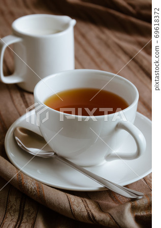 Cup of Tea and Milk for the Time of Tea Break. Cup of Tea and Milk for the Time of Tea Break. 69618372