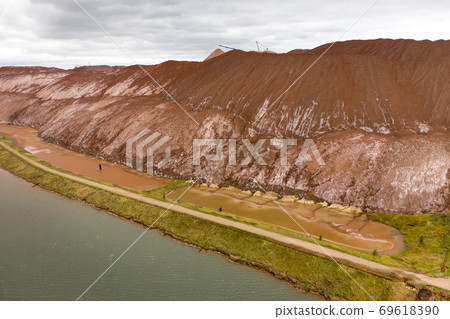 Mountains of products for the production of potash salt and artificial reservoirs.Salt mountains near the city of Soligorsk.Production of fertilizers for the Land. Belarus. 69618390