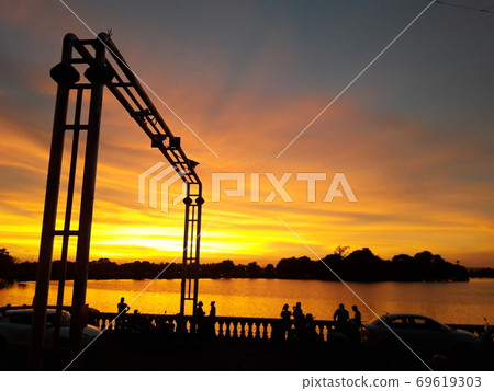Very beautiful, attractive and dramatical sunset near lake .Very beautiful, attractive and dramatical sunset near lake . Very beautiful, attractive and dramatical sunset near lake .Very beautiful, attractive and dramatical sunset near lake . 69619303