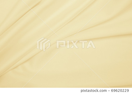 Smooth elegant golden silk or satin luxury cloth texture as wedding background. Luxurious background design. In Sepia toned. Retro style Smooth elegant golden silk or satin luxury cloth texture as wedding background. Luxurious background design. In Sepia toned. Retro style 69620229